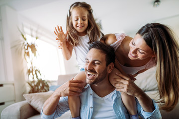 Happy family having fun time at home