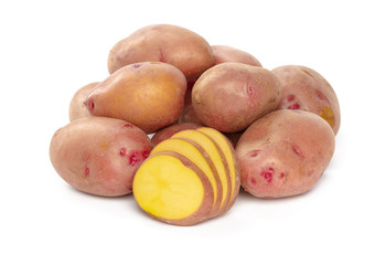 raw potato tuber with slices isolated on white