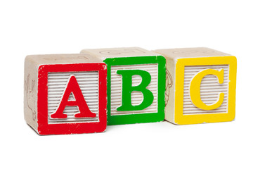 Wooden alphabet blocks isolated on white background