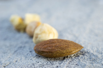 various nuts on a concrete gray background,shallow dof 