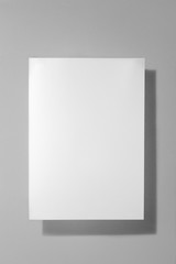 Sheet of gray paper on a gray background for decoration, for text design, for a template
