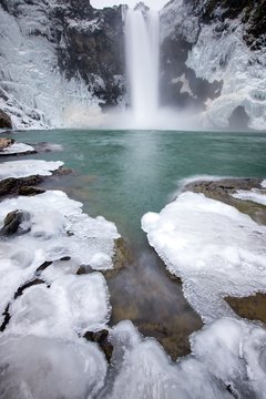 A Long Exposure Of An Icy Snoqualmie Falls In Winter - Washington State