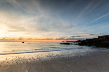 Fototapeta na wymiar Silhouettes at Dusk, Porthcothan beach, Cornwall