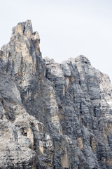 Fototapeta na wymiar Detail of the majestic Sorapiss peak in the italian Alps range, in particoular in the Dolomites. It is one of the highest in this group of mountains around 3000mt on the sea level
