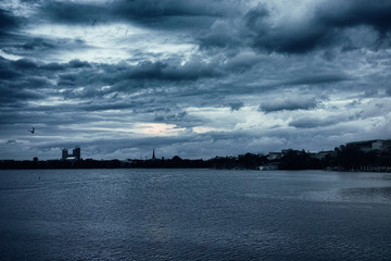 Alster skyline Hamburg, Germany under a dramatic sky blue morning