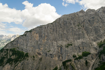 Landscape view from an excursion trail in the Dolomites mountains. This mountain range is part of the Italian Alps and is a really unique sight because of the particular kind of stone it is made of