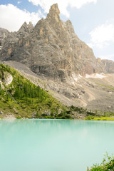 The wonderfull Sorapis lake and mountain in the italian Alps, in the Dolomites range close to Cortina D'ampezzo in Veneto regio, a unique place. The water of the lake is so blue it seems unreal