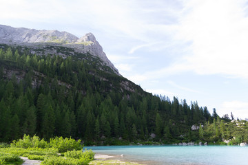 Detail shot of the wonderfull Sorapiss lake in the italian Alps, in the Dolomites mountains range close to Cortina in Veneto region, a unique place. The water of the lake is so blue it seems unreal