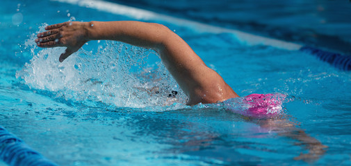 Swimmer athlete swim crawl stroke in pool track