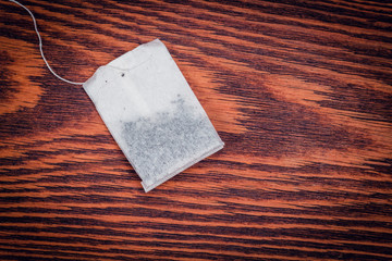 Tea bag on  wood