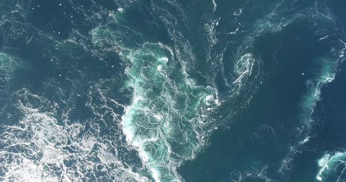 Footage of abstract water currents, rapids and whirlpools in fjord. Saltstraumen, Norway