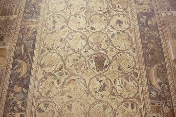 Ancient Roman floor mosaic in the Saint Stevens Church at an archeological site in Umm ar-Rasas,...