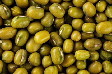 Green mung beans background. Macro texture. Vegetarian Protein
