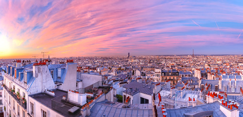 Aerial panoramic view from Montmartre over Paris roofs and Eiffel tower at nice sunrise, Paris,...