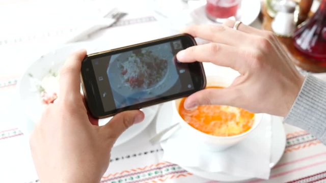Take a photo picture of food with mobile phone camera view slide gallery