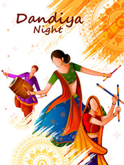 People playing traditional folk dance Garba on Dandiya night celebrating Navratri during Dussehra