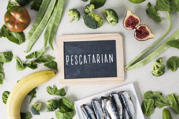 vegetables, fruit, sardines and text pescatarian
