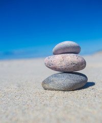 Fototapeta na wymiar Three beauty stones on the beach