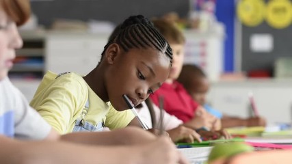 African girl at elementary school - Powered by Adobe