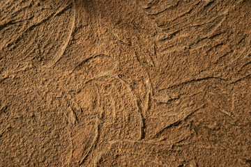 Abstract drawing of red cement with solar glare. Large grains create a unique pattern