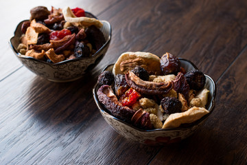 Dried Fruits; Apple, Apricot, Mulberry, Raisin, Fig, Cranberry, Raspberry and Date in Bowl.