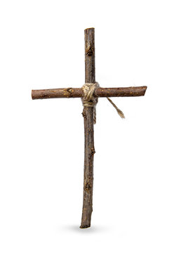 The cross is made of old wood and has a rope tied at the core. isolated on white background.