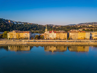 Fototapeta premium Budapest, Hungary - Aerial view of Buda riverside (Budai Rakpart) at sunrise with clear blue sky