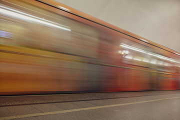 Naklejka na ściany i meble Train in motion in the subway as an abstract background