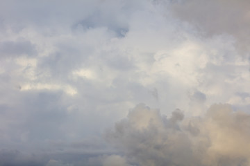 Naklejka na ściany i meble White creamy clouds in the sky as a background
