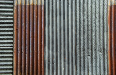 Background and detail of Old rusted zinc wall. for decorative vintage or retro wallpaper style.