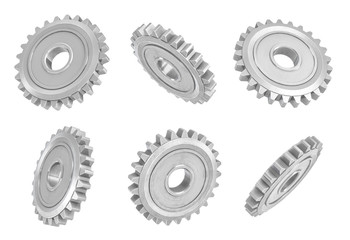 3d rendering of several metal spur gears hanging in different angles on a white background.