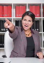 Angry business woman screaming. Dismissal concept