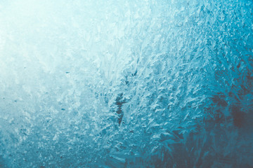 Obraz premium Frosty pattern on the glass of car