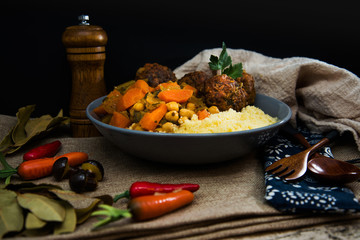 Kofta Tagine Moroccan Meatballs Served With Semolina and Vegetables