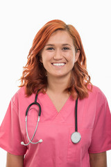 Portrait of young female doctor with stethoscope standing