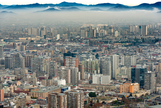 A layer of smog covers downtown Santiago, Chile