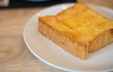 Bread on white plate.