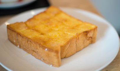 Bread on white plate.