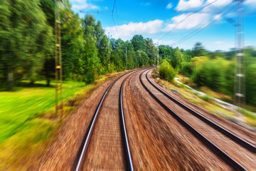 Fototapeta na wymiar Railway tracks with motion blur effect