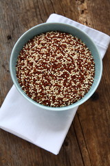 Red And White Quinoa In A Bowl With Napkin Top Down