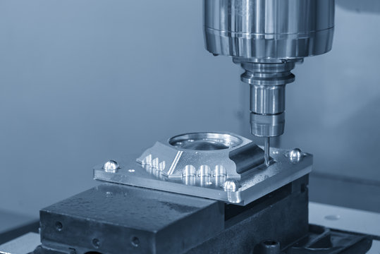 The CNC milling machine cutting the injection mold part by solid ball end mill tool.Mold manufacturing process.