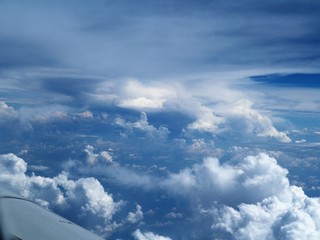 Fototapeta na wymiar Sky outside window airplane