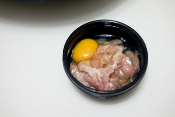 Fresh raw meal pork with eggs