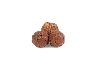 chocolate corn balls in on a white background