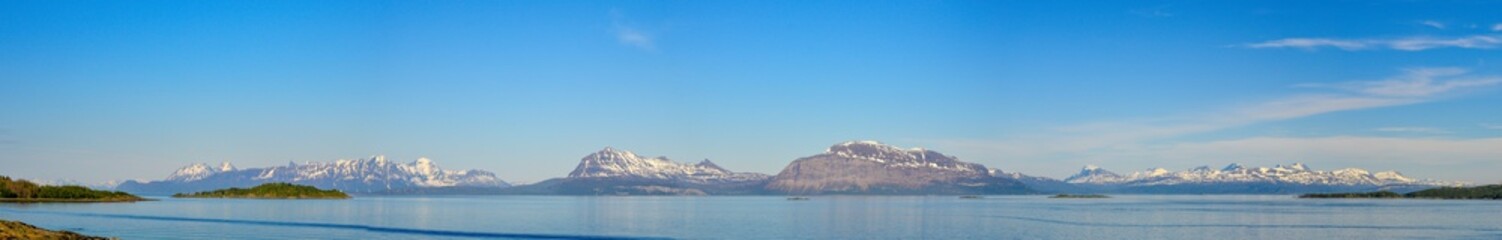 Fototapeta na wymiar Panorama of snowed mountain in Lofotens islands, Norway.