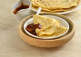 Pancakes /crepes/ with caramel sauce