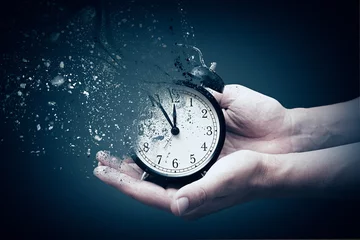 Foto op Plexiglas Concept of passing away, the clock breaks down into pieces © Proxima Studio
