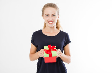 Portrait of a smiling girl, woman holding stack of gift boxes isolated on white background. Holiday concept. Mock up, template.