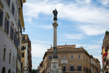 Fototapeta na wymiar Obelisk with Mary on top