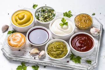 Sauce set assortment - mayonnaise, mustard, ketchup and others.